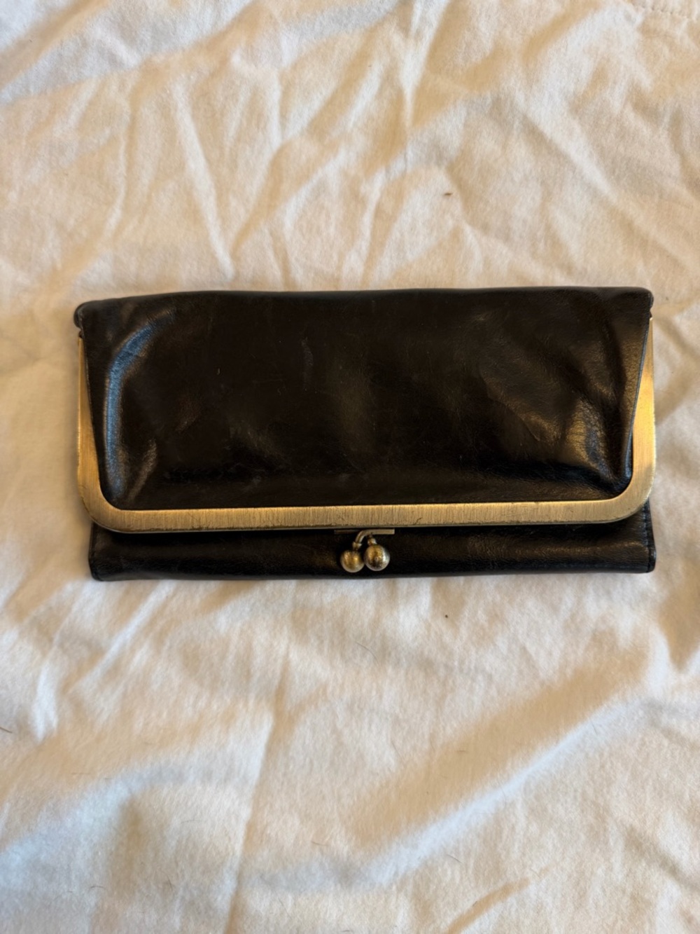 HOBO Black Leather Clutch Wallet with Brass Trim